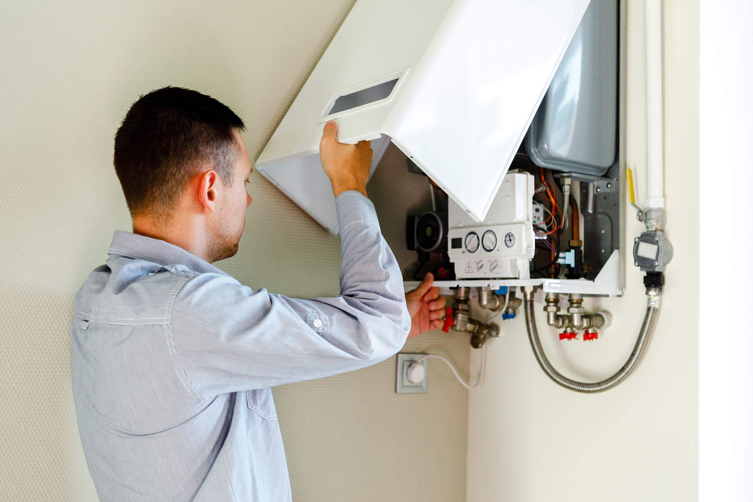 Plumber attaches Trying To Fix the Problem with the Residential